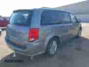 2014 Dodge Grand Caravan SXT with VIN 2C4RDGCG2ER155157, listed as a IAAI auction lot 43513121 with 131,845 mi miles and . Bid and sale history available at DreamBid. Image 4.