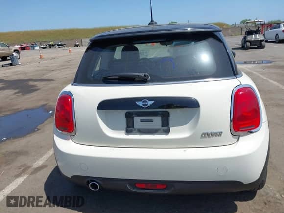 2017 MINI Hardtop Cooper with VIN WMWXP5C39H2D71459, listed as a IAAI auction lot 42111245 with 97,759 mi miles and . Bid and sale history available at DreamBid. Image 16.