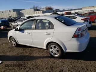 2011 Chevrolet Aveo 1LT z VIN KL1TD5DE4BB231079, wystawiony jako Copart lot #77172654 z przebiegiem 108 083 mil mil oraz Czysty tytuł • Clean title. Historia ofert i sprzedaży dostępna na DreamBid. Obrazek 2.