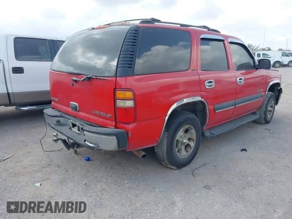 2002 Chevrolet Tahoe LS with VIN 1GNEC13V92R311538, listed as a IAAI auction lot 43337869 with 305,050 mi miles and . Bid and sale history available at DreamBid. Image 4.
