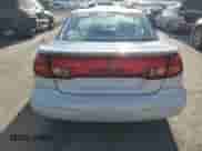 1999 Saturn SC with VIN 1G8ZR1275XZ375833, listed as a Copart auction lot 87960885 with 97,697 mi miles and Salvage title. Bid and sale history available at DreamBid. Image 6.