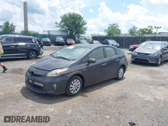 2013 Toyota Prius with VIN JTDKN3DP2D3048347, listed as a IAAI auction lot 42728510 with 146,996 mi miles and . Bid and sale history available at DreamBid. Image 2.