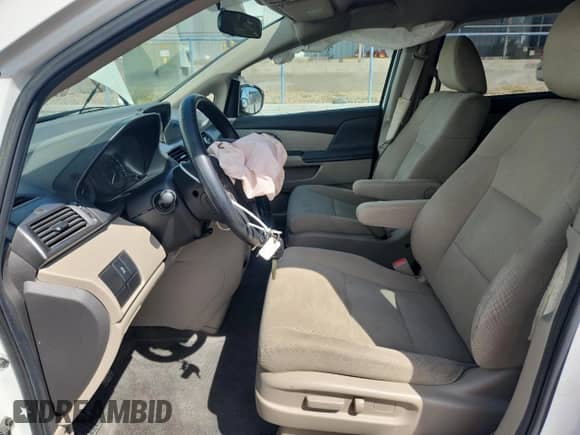 2014 Honda Odyssey LX with VIN 5FNRL5H22EB008112, listed as a Copart auction lot 70187875 with 86,365 mi miles and Salvage title. Bid and sale history available at DreamBid. Image 7.