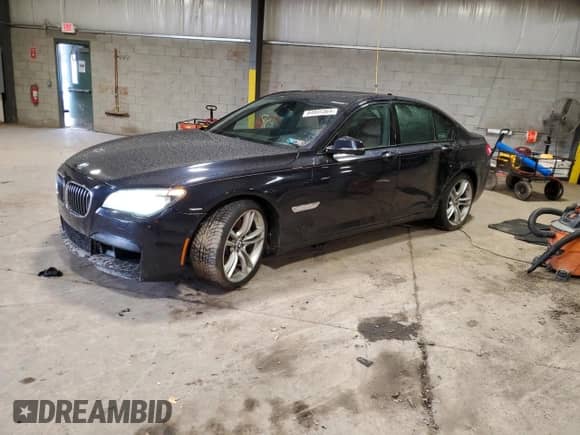 2014 BMW 7 Series 750i xDrive с VIN WBAYB6C55ED224739, выставлен на аукционе Copart как лот 84935364 с пробегом 173 805 миль миль и Списание • Salvage title. История ставок и продаж доступна на DreamBid. Изображение 1.