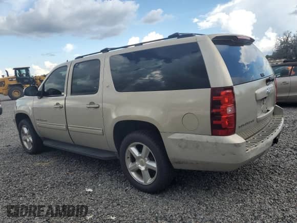 2009 Chevrolet Suburban 2LT with VIN 1GNFC260X9R265285, listed as a Copart auction lot 68830625 with 200,095 mi miles and Salvage title. Bid and sale history available at DreamBid. Image 2.