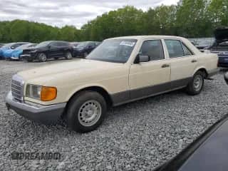 1985 Mercedes-Benz 380 with VIN WDBCA32CXFA177708, listed as a Copart auction lot 57909505 with 128,446 mi miles and Clean title. Bid and sale history available at DreamBid. Image 1.