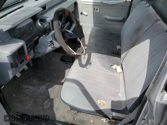 1988 Dodge RAM with VIN JB7FL24D7JP103516, listed as a Copart auction lot 59259515 with 210,940 mi miles and Salvage title. Bid and sale history available at DreamBid. Image 7.