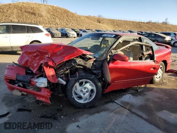 1995 Saturn SC z VIN 1G8ZG1271SZ308127, wystawiony jako Copart lot #47142725 z przebiegiem 158 207 mil mil oraz Nie do naprawy • Non repairable. Historia ofert i sprzedaży dostępna na DreamBid. Obrazek 1.