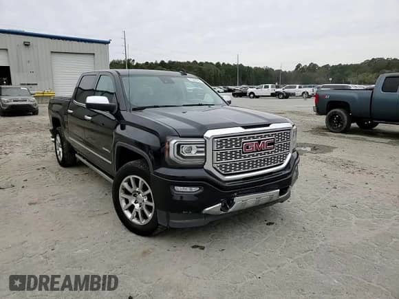 2017 GMC Sierra 1500 Denali z VIN 3GTP1PEJ5HG469260, wystawiony jako Copart lot #75467274 z przebiegiem 214 477 mil mil oraz Szkoda całkowita • Salvage title. Historia ofert i sprzedaży dostępna na DreamBid. Obrazek 13.