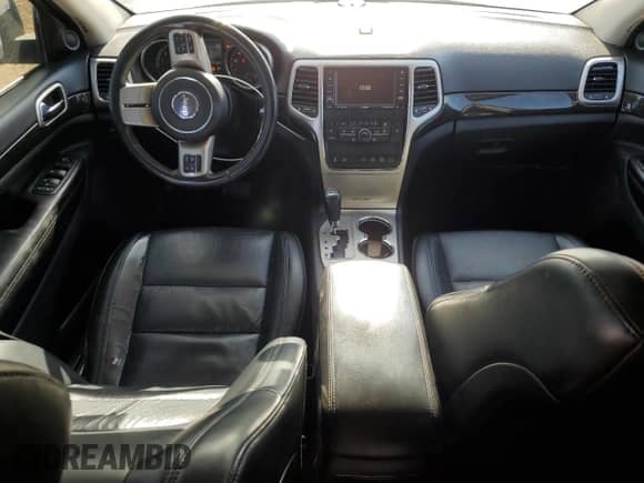 2011 Jeep Grand Cherokee 70th Anniversary z VIN 1J4RR4GT4BC511713, wystawiony jako Copart lot #85508804 z przebiegiem 121 972 mil mil oraz Szkoda całkowita • Salvage title. Historia ofert i sprzedaży dostępna na DreamBid. Obrazek 8.