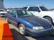 1996 Chevrolet Lumina z VIN 2G1WL52M5T9112066, wystawiony jako IAAI lot #43165152 z przebiegiem 93 151 mil mil oraz . Historia ofert i sprzedaży dostępna na DreamBid. Obrazek 1.