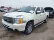 2012 GMC Sierra 1500 Denali with VIN 3GTP2XE22CG189407, listed as a IAAI auction lot 41538023 with 330,998 mi miles and . Bid and sale history available at DreamBid. Image 2.