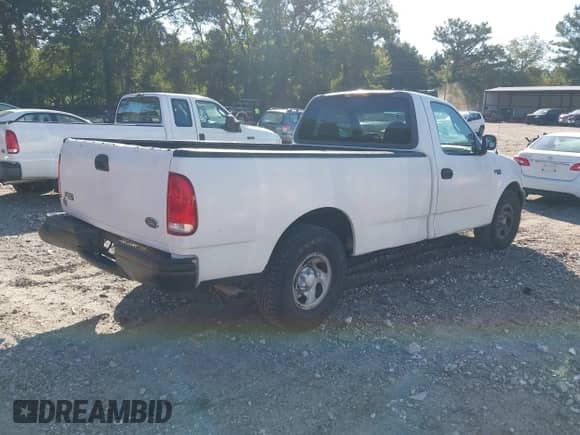 2001 Ford F-150 XL z VIN 1FTZF17211NA41809, wystawiony jako IAAI lot #43159562 z przebiegiem 134 382 mil mil oraz . Historia ofert i sprzedaży dostępna na DreamBid. Obrazek 4.