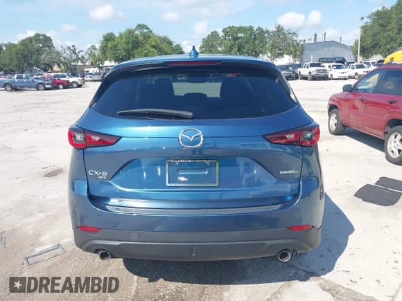 2023 Mazda CX-5 S Carbon Edition z VIN JM3KFBCM6P0112207, wystawiony jako IAAI lot #42747977 z przebiegiem 33 488 mil mil oraz . Historia ofert i sprzedaży dostępna na DreamBid. Obrazek 16.