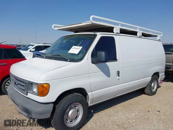 2004 Ford Econoline Cargo with VIN 1FTRE14WX4HA95414, listed as a IAAI auction lot 42933643 with 65,430 mi miles and . Bid and sale history available at DreamBid. Image 14.
