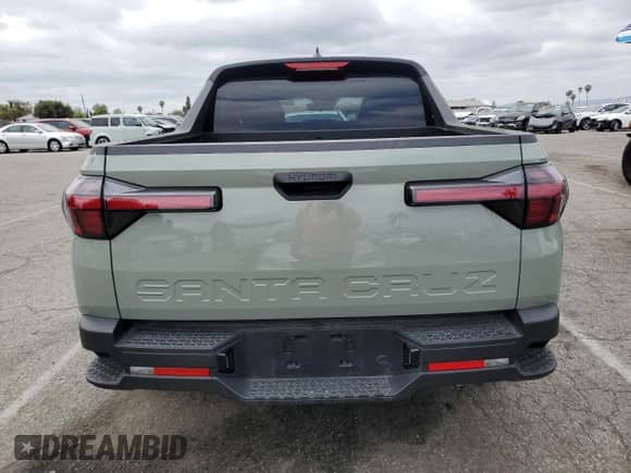2025 Hyundai Santa Cruz SEL z VIN 5NTJB4DE1SH127083, wystawiony jako Copart lot #53869165 z przebiegiem 5 366 mil mil oraz Szkoda całkowita • Salvage title. Historia ofert i sprzedaży dostępna na DreamBid. Obrazek 6.