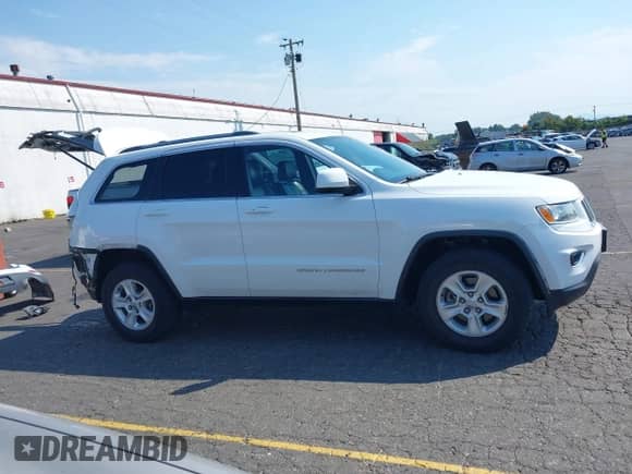 2015 Jeep Grand Cherokee Altitude with VIN 1C4RJFAG5FC764727, listed as a IAAI auction lot 43076470 with 152,602 mi miles and . Bid and sale history available at DreamBid. Image 14.