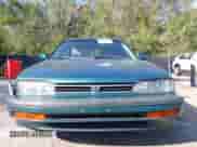 1993 Honda Accord with VIN 1HGCB9756PA008980, listed as a IAAI auction lot 43274955 with 184,912 mi miles and . Bid and sale history available at DreamBid. Image 6.