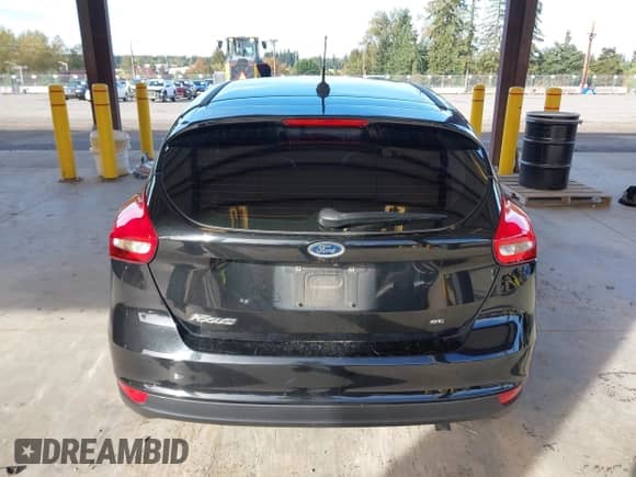 2015 Ford Focus SE z VIN 1FADP3K2XFL306875, wystawiony jako IAAI lot #43368410 z przebiegiem 220 758 mil mil oraz . Historia ofert i sprzedaży dostępna na DreamBid. Obrazek 16.