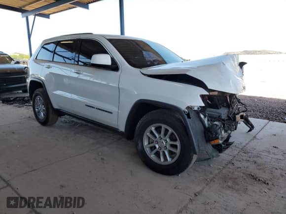 2018 Jeep Grand Cherokee Laredo z VIN 1C4RJEAG7JC480700, wystawiony jako Copart lot #56788835 z przebiegiem Nie podano mil oraz Szkoda całkowita • Salvage title. Historia ofert i sprzedaży dostępna na DreamBid. Obrazek 4.