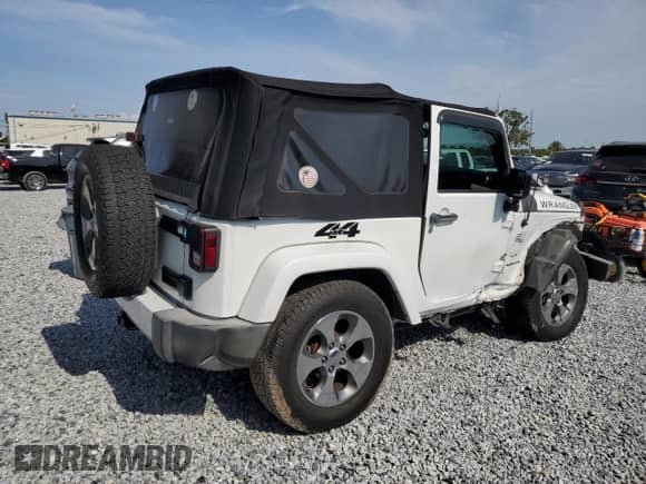 2016 Jeep Wrangler Sahara with VIN 1C4AJWBG4GL234262, listed as a Copart auction lot 58742355 with 133,152 mi miles and Salvage title. Bid and sale history available at DreamBid. Image 3.