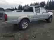 2003 Nissan Frontier SVE with VIN 1N6MD29Y93C437697, listed as a Copart auction lot 57881505 with 204,981 mi miles and Clean title. Bid and sale history available at DreamBid. Image 3.