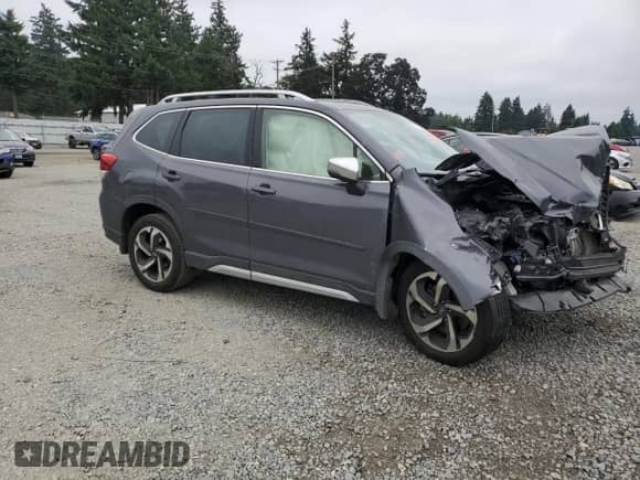 2022 Subaru Forester Touring z VIN JF2SKARC0NH529366, wystawiony jako Copart lot #70716275 z przebiegiem 108 830 mil mil oraz Szkoda całkowita • Salvage title. Historia ofert i sprzedaży dostępna na DreamBid. Obrazek 4.