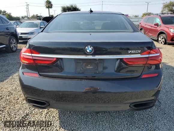 2017 BMW 7 Series 750i с VIN WBA7F0C39HGM21489, выставлен на аукционе Copart как лот 65051675 с пробегом 79 416 миль миль и Чистый • Clean title. История ставок и продаж доступна на DreamBid. Изображение 6.