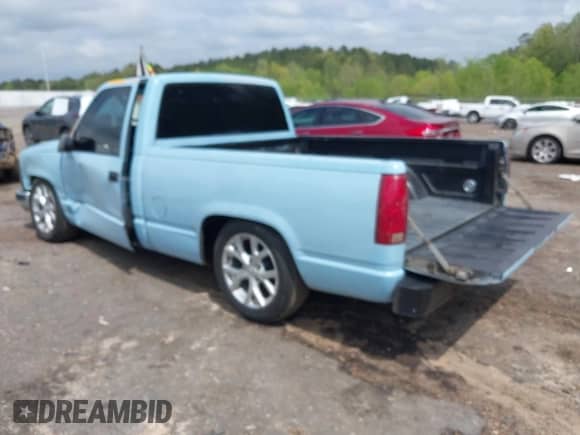 1989 GMC Sierra 1500 z VIN 1GTDC14K7KZ539594, wystawiony jako IAAI lot #41919046 z przebiegiem 80 364 mil mil oraz . Historia ofert i sprzedaży dostępna na DreamBid. Obrazek 3.
