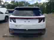 2025 Hyundai Tucson SEL with VIN 5NMJFCDE1SH497492, listed as a Copart auction lot 70523465 with 18 mi miles and Salvage title. Bid and sale history available at DreamBid. Image 6.