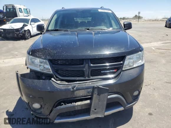 2013 Dodge Journey R/T с VIN 3C4PDDEG2DT659769, выставлен на аукционе Copart как лот 67821545 с пробегом 157 138 миль миль и Списание • Salvage title. История ставок и продаж доступна на DreamBid. Изображение 5.