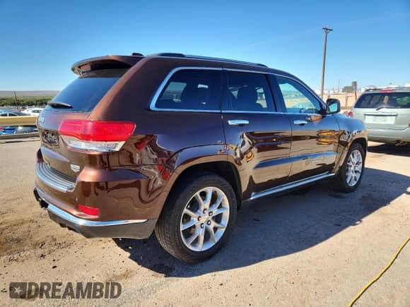2014 Jeep Grand Cherokee Summit с VIN 1C4RJFJG1EC276194, выставлен на аукционе Copart как лот 86811285 с пробегом 139 471 миль миль и Списание • Salvage title. История ставок и продаж доступна на DreamBid. Изображение 3.
