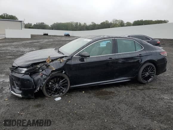 2023 Toyota Camry Hybrid XSE с VIN 4T1K31AK0PU614339, выставлен на аукционе Copart как лот 68635715 с пробегом 87 939 миль миль и Списание • Salvage title. История ставок и продаж доступна на DreamBid. Изображение 1.