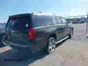 2015 Chevrolet Suburban LTZ with VIN 1GNSCKKC1FR144669, listed as a IAAI auction lot 42558221 with 199,669 mi miles and . Bid and sale history available at DreamBid. Image 4.