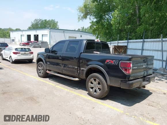 2013 Ford F-150 XL with VIN 1FTFW1ET6DFC56180, listed as a IAAI auction lot 42456802 with 188,020 mi miles and . Bid and sale history available at DreamBid. Image 3.