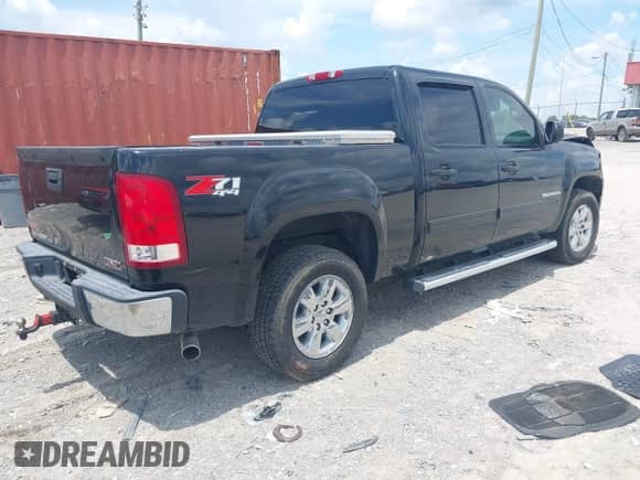 2009 GMC Sierra 1500 SLT with VIN 3GTEK33M49G202512, listed as a IAAI auction lot 42752111 with 166,671 mi miles and . Bid and sale history available at DreamBid. Image 4.