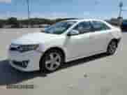 2012 Toyota Camry SE with VIN 4T1BF1FK9CU593100, listed as a Copart auction lot 82400375 with 165,575 mi miles and Salvage title. Bid and sale history available at DreamBid. Image 1.