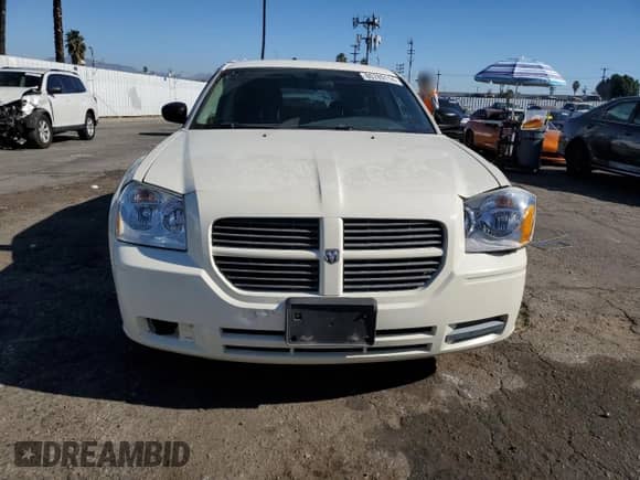 2005 Dodge Magnum SE с VIN 2D4FV48V05H153020, выставлен на аукционе Copart как лот 80789114 с пробегом 204 180 миль миль и Списание • Salvage title. История ставок и продаж доступна на DreamBid. Изображение 5.