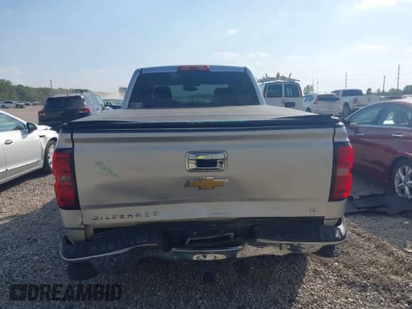 2014 Chevrolet Silverado 1500 LT with VIN 3GCUKREC0EG343333, listed as a IAAI auction lot 43328983 with 143,254 mi miles and . Bid and sale history available at DreamBid. Image 16.