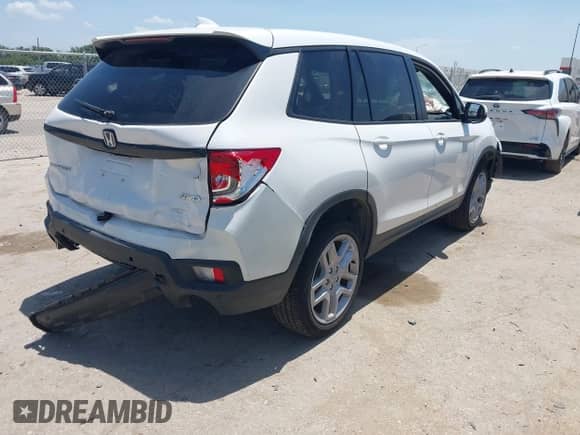 2025 Honda Passport EX-L with VIN 5FNYF8H55SB011791, listed as a IAAI auction lot 42749643 with 12,183 mi miles and . Bid and sale history available at DreamBid. Image 4.