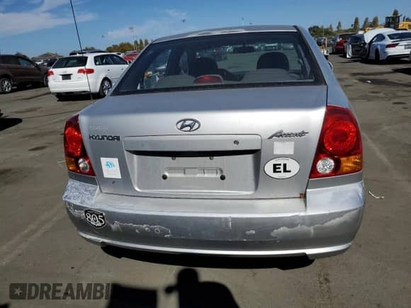 2003 Hyundai Accent GL с VIN KMHCG45CX3U488238, выставлен на аукционе Copart как лот 74399014 с пробегом 130 915 миль миль и Чистый • Clean title. История ставок и продаж доступна на DreamBid. Изображение 6.