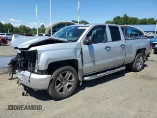 2017 Chevrolet Silverado 1500 Custom with VIN 1GCVKPEC4HZ374307, listed as a Copart auction lot 70198985 with 198,658 mi miles and Salvage title. Bid and sale history available at DreamBid. Image 1.