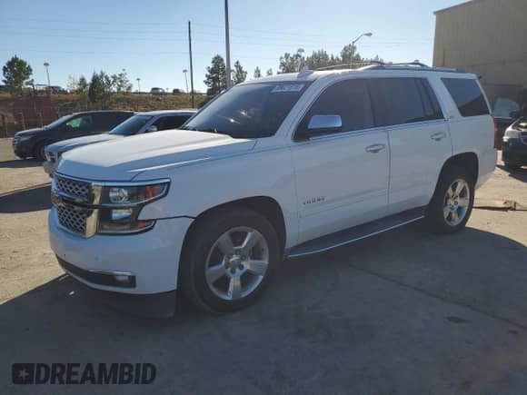 2015 Chevrolet Tahoe LTZ with VIN 1GNSKCKC3FR747549, listed as a Copart auction lot 89621815 with 253,340 mi miles and Clean title. Bid and sale history available at DreamBid. Image 1.