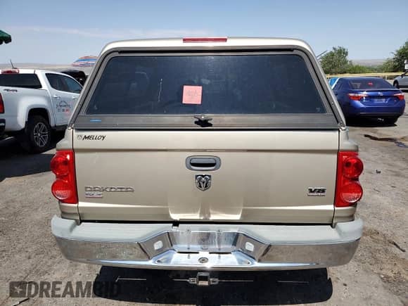 2005 Dodge Dakota SLT with VIN 1D7HW42N15S296438, listed as a Copart auction lot 62324695 with 80,430 mi miles and Salvage title. Bid and sale history available at DreamBid. Image 6.