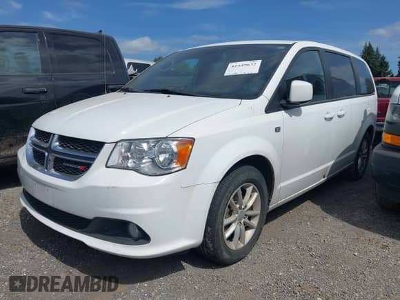 2019 Dodge Grand Caravan SE z VIN 2C4RDGBG2KR759787, wystawiony jako IAAI lot #42459632 z przebiegiem 75 384 mil mil oraz . Historia ofert i sprzedaży dostępna na DreamBid. Obrazek 17.