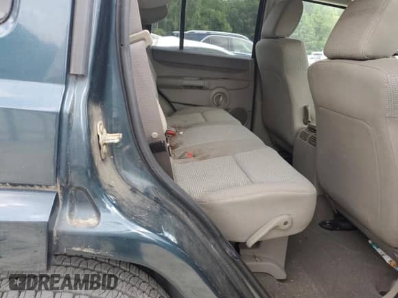 2006 Jeep Commander z VIN 1J8HG48K56C104463, wystawiony jako Copart lot #67740515 z przebiegiem 100 019 mil mil oraz Szkoda całkowita • Salvage title. Historia ofert i sprzedaży dostępna na DreamBid. Obrazek 11.