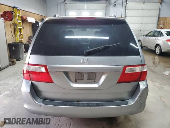 2007 Honda Odyssey EX-L z VIN 5FNRL38647B030512, wystawiony jako Copart lot #67827645 z przebiegiem Nie podano mil oraz Czysty tytuł • Clean title. Historia ofert i sprzedaży dostępna na DreamBid. Obrazek 6.