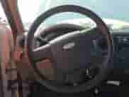 2005 Ford F-150 XL z VIN 1FTRF12WX5KE14539, wystawiony jako IAAI lot #43600244 z przebiegiem 180 608 mil mil oraz . Historia ofert i sprzedaży dostępna na DreamBid. Obrazek 6.