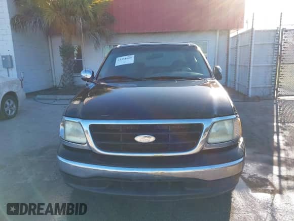 2003 Ford F-150 XLT z VIN 1FTRW07613KB48604, wystawiony jako IAAI lot #43381665 z przebiegiem Nie podano mil oraz . Historia ofert i sprzedaży dostępna na DreamBid. Obrazek 6.