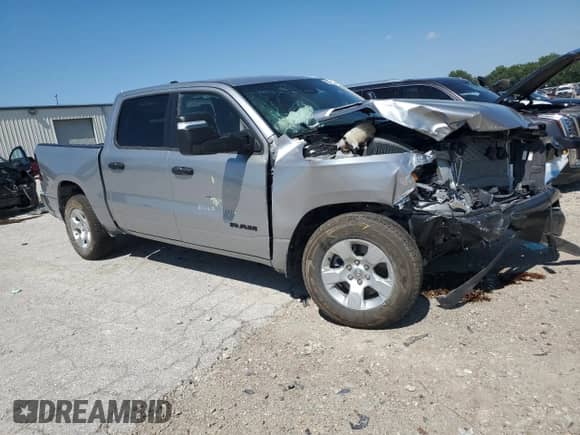 2025 Ram 1500 Tradesman with VIN 1C6RRFGGXSN674348, listed as a Copart auction lot 62982755 with 10,596 mi miles and Salvage title. Bid and sale history available at DreamBid. Image 4.